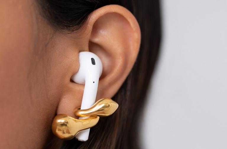 Jewelry to help keep the headphones on