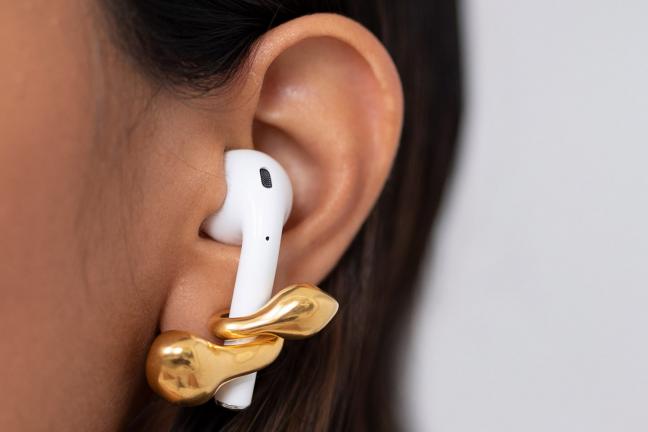 Jewelry to help keep the headphones on